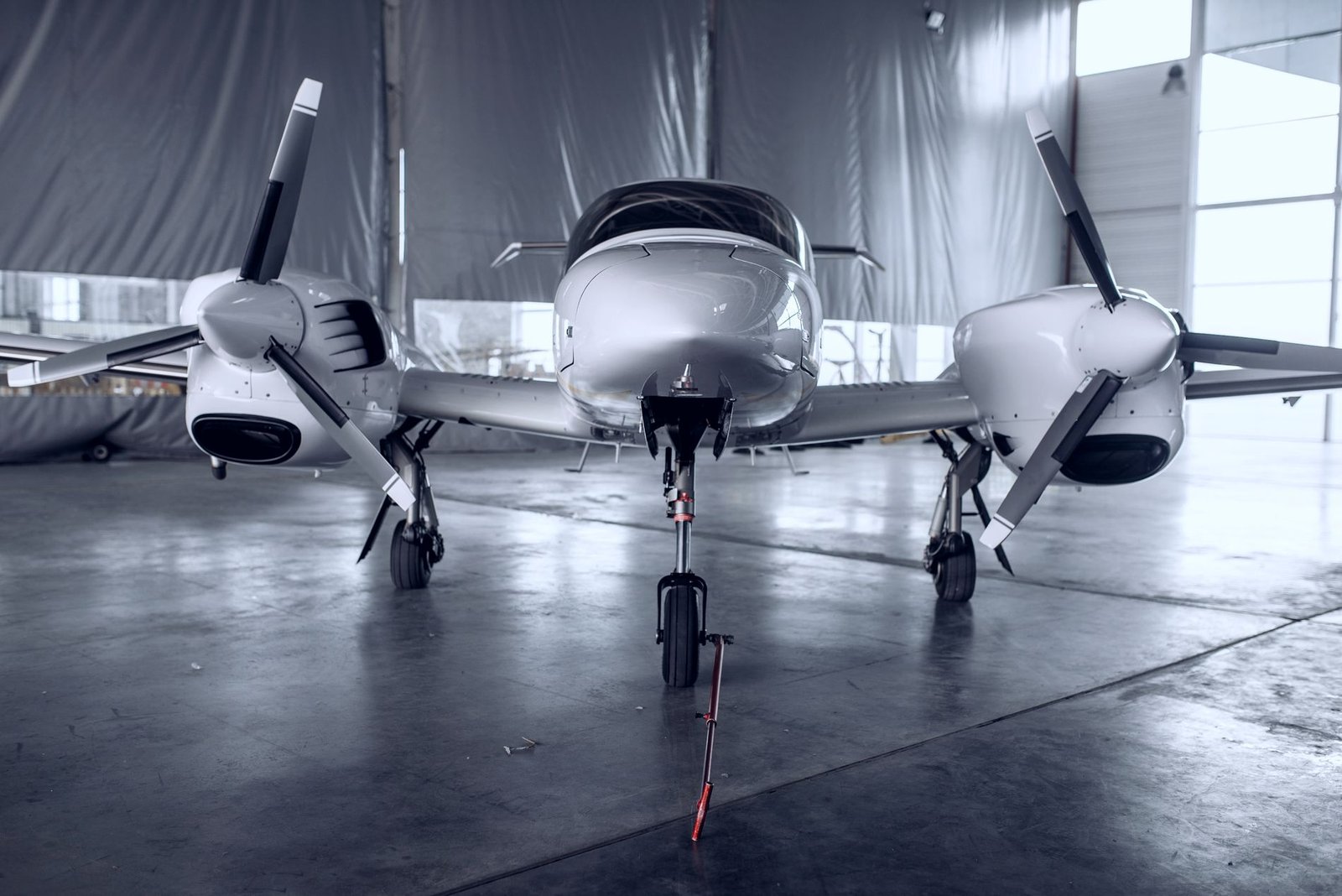 Twin turboprop in a hangar
